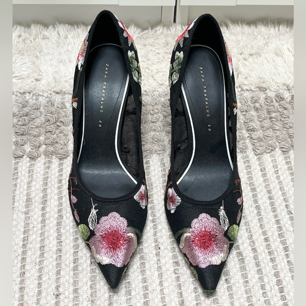 Sheer black heels with flowers